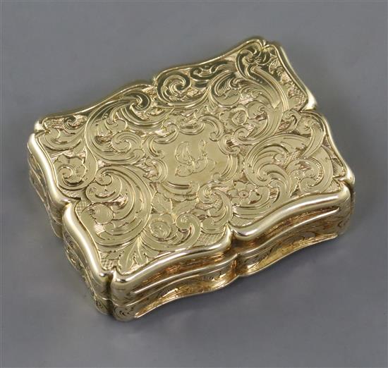 A mid 19th century unmarked gold (tests as 15ct) vinaigrette, in fitted box, 21.1 grams.